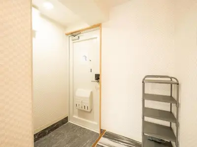 a small bathroom with a toilet and a ladder at Ilman Hishimo Mansion - Vacation STAY 19432 in Tokyo