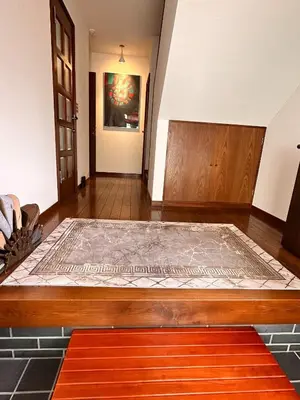 a large bed in a room with a painting on the wall at Adachi-ku - House - Vacation STAY 19179 in Tokyo