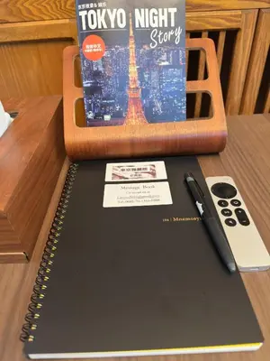 a laptop on a table with a book and a pen at Adachi-ku - House - Vacation STAY 19179 in Tokyo