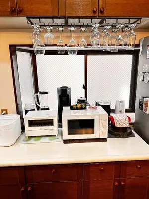 a kitchen with microwaves and appliances on a counter at Adachi-ku - House - Vacation STAY 19179 in Tokyo