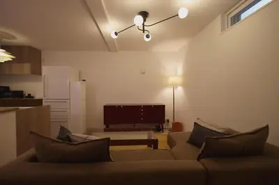a living room with a couch and a tv at Nakano-ku - House - Vacation STAY 19255 in Tokyo
