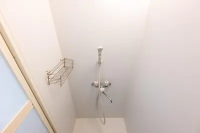 a shower in a white room with a shower at Kodenmacho Building Room 201 - Vacation STAY 38318v in Tokyo