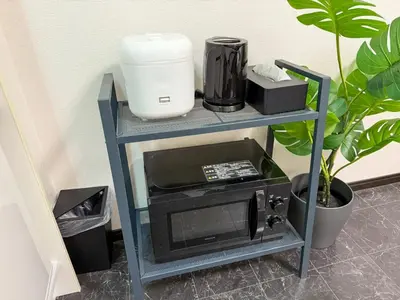 a blue shelf with a microwave on it at Kodenmacho Building Room 201 - Vacation STAY 38292v in Tokyo