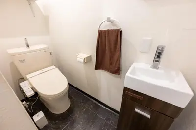 a bathroom with a toilet and a sink at Kodenmacho Building Room 201 - Vacation STAY 38292v in Tokyo