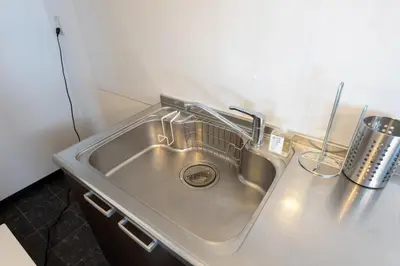 a stainless steel sink in a kitchen at Kodenmacho Building Room 201 - Vacation STAY 38324v in Tokyo
