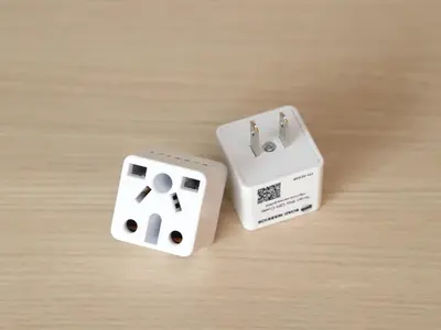 two white dice sitting on top of a wooden table at Smile Hotel Shinagawa Sengakuji Ekimae - Vacation STAY 67645v in Tokyo