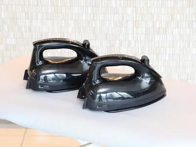 two black helmets sitting on top of a table at Smile Hotel Shinagawa Sengakuji Ekimae - Vacation STAY 67645v in Tokyo
