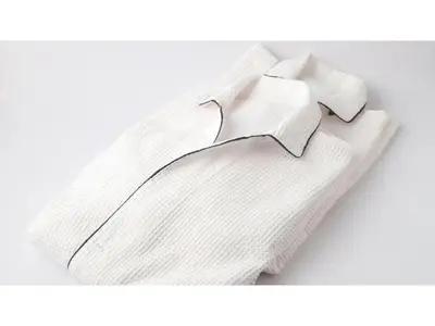 a white sweater with a tie on a white background at Smile Hotel Tokyo Nishikasai - Vacation STAY 67970v in Tokyo