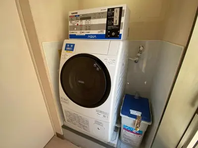 a washing machine with a box on top of it at Smile Hotel Tokyo Nishikasai - Vacation STAY 67945v in Tokyo