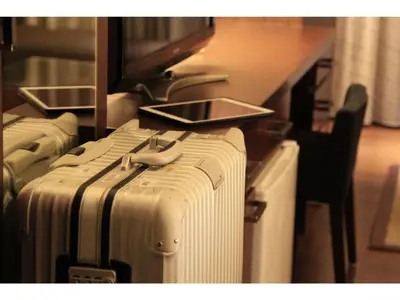 a group of suitcases sitting on a table in an airplane at Smile Hotel Tokyo Nishikasai - Vacation STAY 67949v in Tokyo