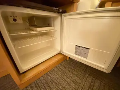 an empty refrigerator with its door open in a kitchen at Smile Hotel Tokyo Nishikasai - Vacation STAY 67938v in Tokyo