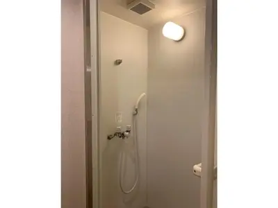 a bathroom with a shower with a shower head at HOTEL PRELE Asakusa - Vacation STAY 74351v in Tokyo
