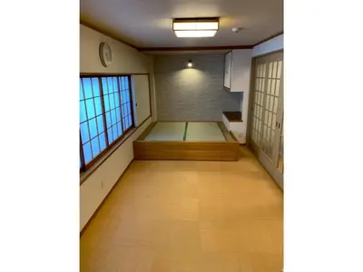 an empty room with a bed in the middle at HOTEL PRELE Asakusa - Vacation STAY 74363v in Tokyo