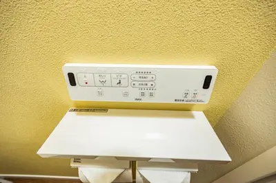 a white object is on top of a wall at Hiro Yanaka hotel TT0421 in Tokyo