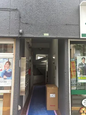a box sitting in the hallway of a building at \u6587\u4eachouse103 in Tokyo