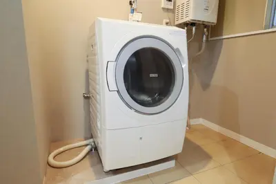 a washer and dryer sitting in a room at Japanese Modern House Aakasaka-Mitsuke St 2min Shibuya Shinjuku 9min in Tokyo