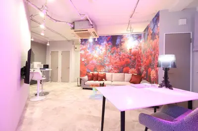 a room with a couch and a table with chairs at Japanese Modern House Aakasaka-Mitsuke St 2min Shibuya Shinjuku 9min in Tokyo