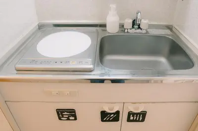 a kitchen counter with a sink and a sink at Kabukicho 507-SJ0011 in Tokyo
