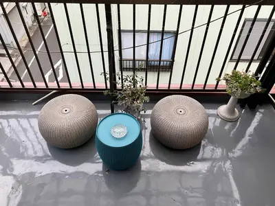 a group of three large spheres sitting on a balcony at Uenoyuyunoie - Vacation STAY 19367 in Tokyo
