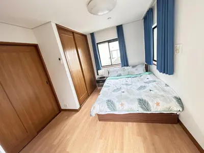 a bedroom with a bed and a window at GreatViewHouse - Vacation STAY 19425 in Tokyo