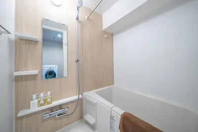 a bathroom with a sink and a mirror at Improve Nishi Magome - Vacation STAY 19513 in Tokyo
