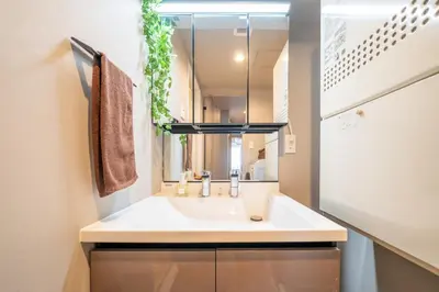 a bathroom with a sink and a mirror at Improve Nishi Magome - Vacation STAY 19513 in Tokyo