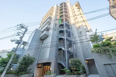 a tall building with power lines in front of it at Improve Nishi Magome - Vacation STAY 19513 in Tokyo