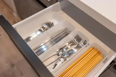a white tray with silver utensils in a drawer at Improve Nishi Magome - Vacation STAY 19541 in Tokyo