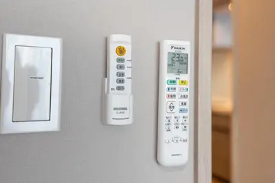two remote controls are attached to a wall at Improve Nishi Magome - Vacation STAY 19541 in Tokyo