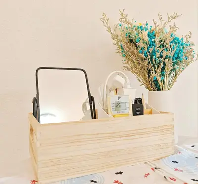 a wooden box with a mirror and flowers on a table at SkyTree-501 in Tokyo