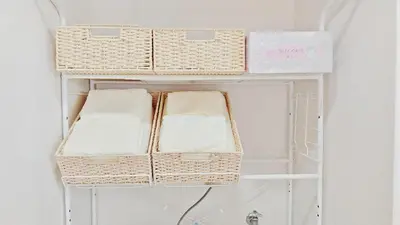 a white shelf with wicker baskets on it at SkyTree-501 in Tokyo