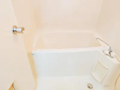 a bathroom with a bath tub with a sink at SkyTree-501 in Tokyo