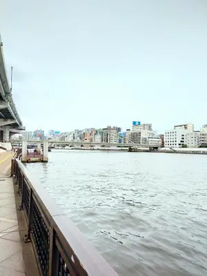 a view of a river with buildings in the background at Galicia Ryogoku Skytree View & Easy Access to Asakusa in Tokyo