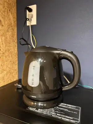 a tea pot sitting on top of a table at Horizon Bleu Asakusa202 in Tokyo
