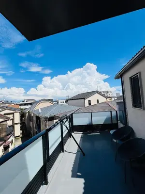 a balcony with a view of the city at AhaiHotel in Wada