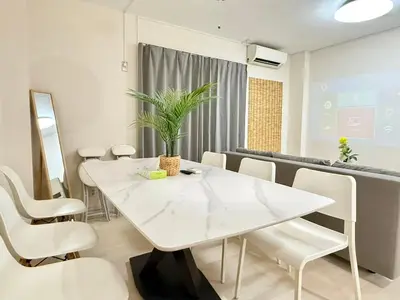 a white dining room with a white table and chairs at \u5c71\u624b\u7dda\u5927\u585a\u99c5 family land 4LDK in Tokyo