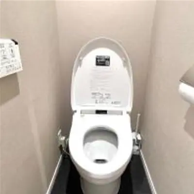 a small bathroom with a toilet in a stall at \u3072\u3060\u307e\u308a One in Tokyo