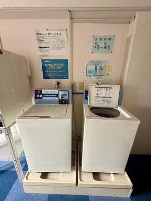 two refrigerators are sitting in a room at \u3059\u304c\u3082\u5c0f\u5bbf in Tokyo