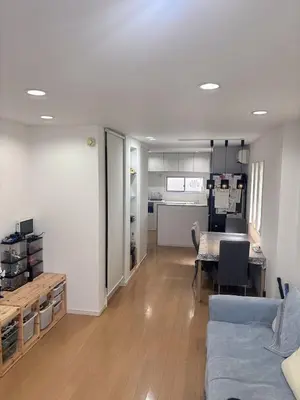 a living room with a couch and a table at Ikebukuro\u6c60\u888b1stop-2min-Kitaikebukuro\u5317\u6c60\u888bwalk3min in Tokyo