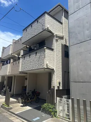 a building with a bike parked in front of it at Ikebukuro\u6c60\u888b1stop-2min-Kitaikebukuro\u5317\u6c60\u888bwalk3min in Tokyo