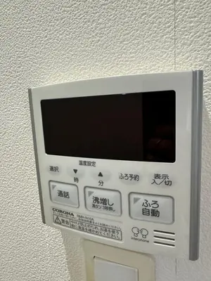 an electronic device with asian writing on a wall at The Birth 501 in Tokyo