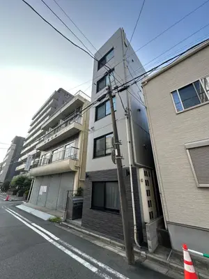 a building on the side of a street at The Birth 501 in Tokyo