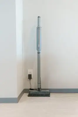 a gray object sitting on a floor next to a wall at Gold HOTEL SHIBUYA in Tokyo