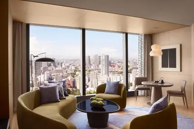 a living room with a view of a city at JW Marriott Hotel Tokyo in Tokyo