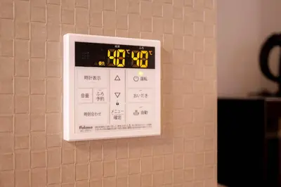 a clock on a wall on a wall at JAPAN APARTMENT HOTEL Itabashi-station, Tokyo in Tokyo