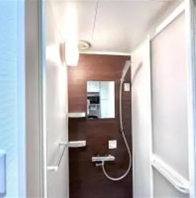 a bathroom with a shower in a room at Shinjuku sumika5 in Tokyo