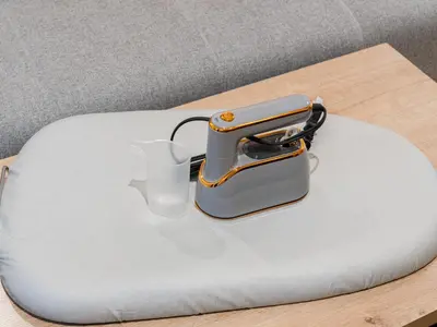 a purse sitting on top of a table at Asakusa-Akihabara-Family-Friendly Stay- 4min Walk to Oshiage Sta- Switch & Mobile Wi-Fi in Tokyo