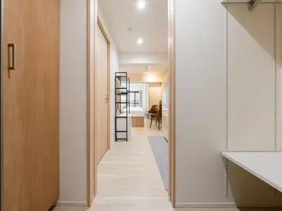a hallway leading to a bedroom with a ladder in a house at Asakusa-Akihabara-Family-Friendly Stay- 4min Walk to Oshiage Sta- Switch & Mobile Wi-Fi in Tokyo