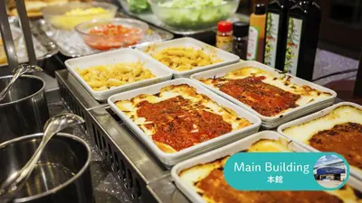 a bunch of trays of food on a table at HOTEL DREAM GATE maihama - Main & Annex in Urayasu