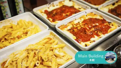a table with trays of pasta and sauce at HOTEL DREAM GATE maihama - Main & Annex in Urayasu